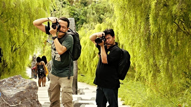 Two photographers at a nature shoot