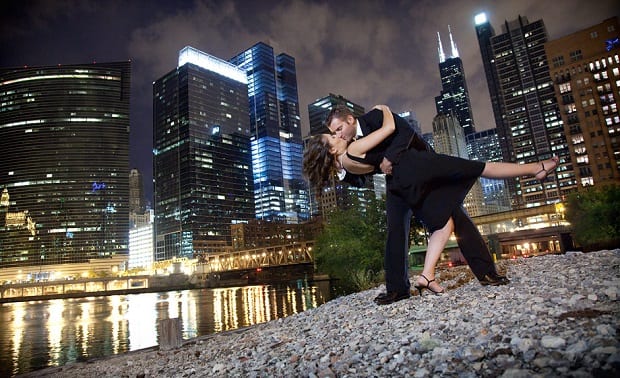 A photo of people kissing at a tilted angle