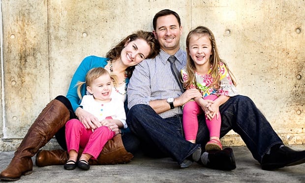 Smiling family in varied clothing