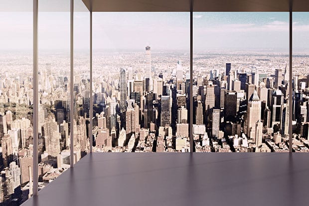 Inside a skyscraper overlooking a cityscape