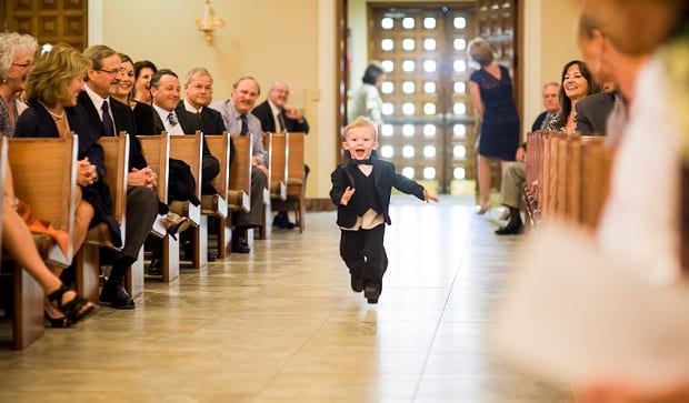 Smiling boy to the altar