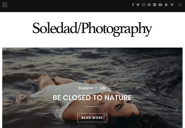 Soledad example homepage, showing a woman floating on water