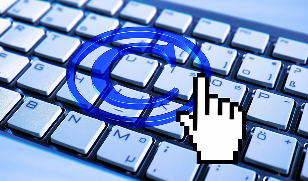 A copyright symbol above a keyboard