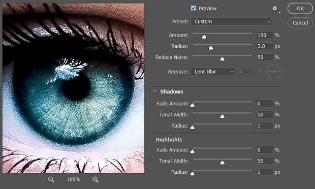 A close up of an eye being edited in Photoshop, with several sliders to the right