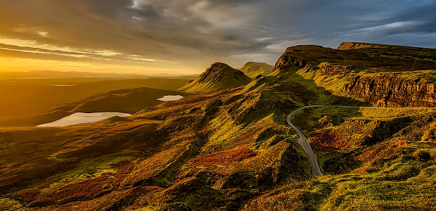 A wide view of a mountain range, photographed at sunset