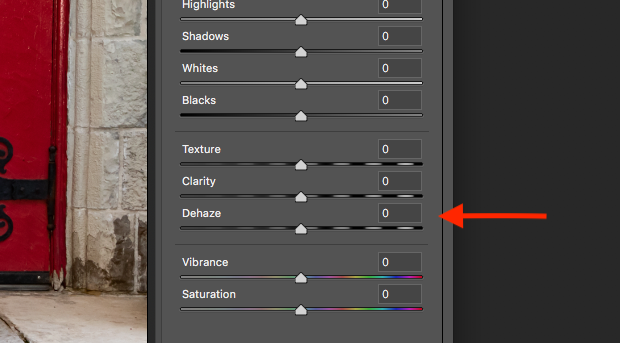"Camera Raw Filter" dialog box with "Dehaze" option indicated with a red arrow. 