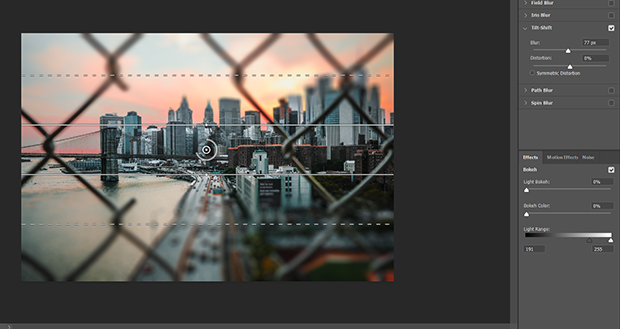 Blur filter applied to cityscape photo in Photoshop