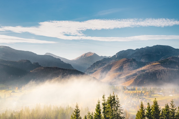 Mountain tops with mist in the foreground