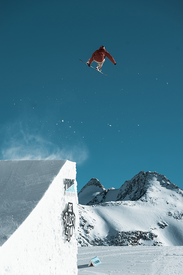 Sports event photography of a snowboarder doing a trick