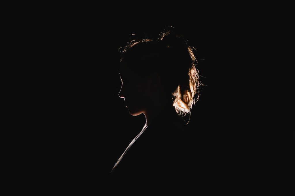 A silhouette of a girl's face posed sideways