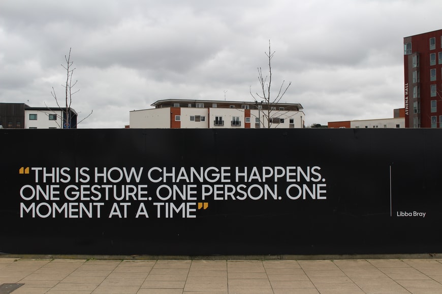 A quote painted on a black wall