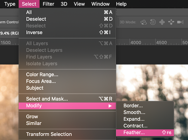 Photoshop Select menu open with Modify and then Feather highlighted